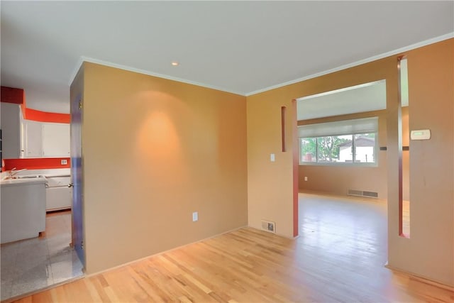1117 Meadowlark Dr, Pittsburgh, PA 15243 - unfurnished room with crown molding and light wood-type flooring