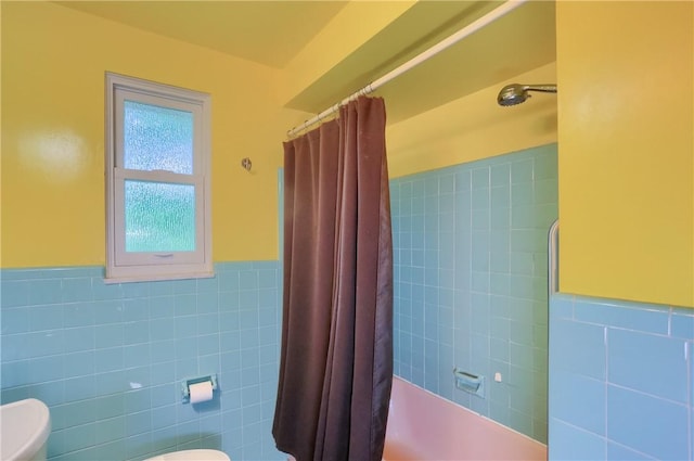 1117 Meadowlark Dr, Pittsburgh, PA 15243 - bathroom with tile walls, shower / tub combo with curtain, and a wainscoted wall