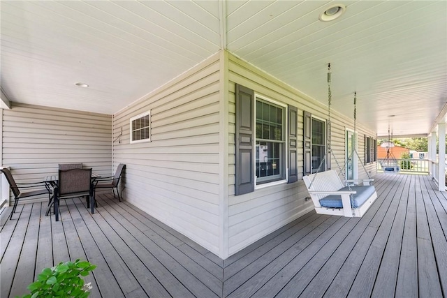 409 Park Rd, Bullskin Twp, PA 15683 - wooden porch with outdoor dining space
