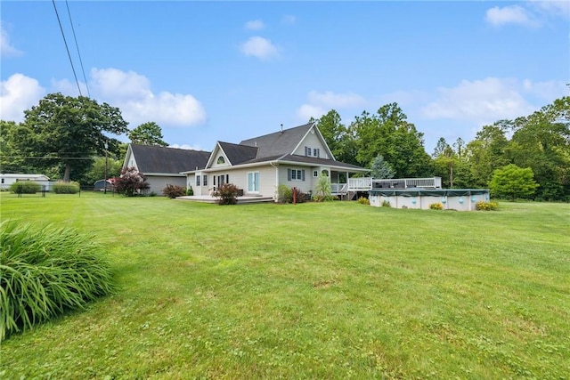 409 Park Rd, Bullskin Twp, PA 15683 - back of property featuring a lawn and a covered pool