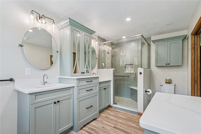 409 Park Rd, Bullskin Twp, PA 15683 - full bathroom featuring vanity, a stall shower, wood finished floors, and recessed lighting