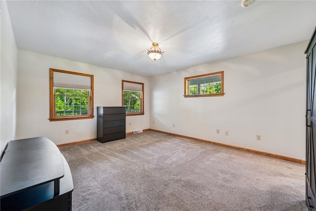 409 Park Rd, Bullskin Twp, PA 15683 - unfurnished bedroom with carpet floors and baseboards