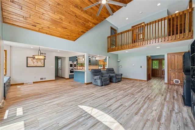 409 Park Rd, Bullskin Twp, PA 15683 - living room with high vaulted ceiling, a ceiling fan, light wood-style flooring, wooden ceiling, and recessed lighting