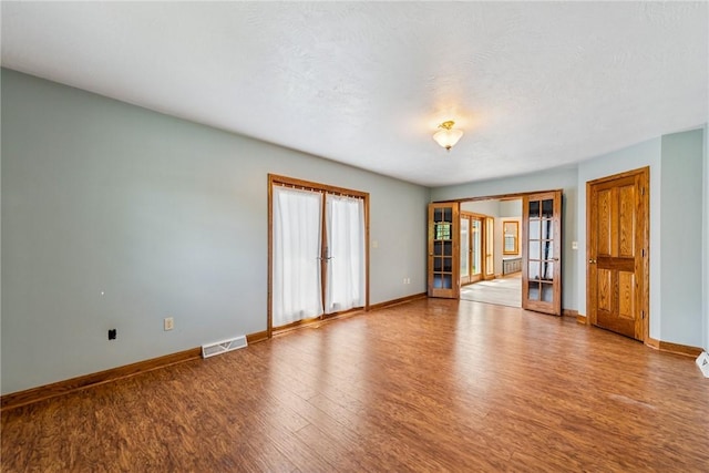 409 Park Rd, Bullskin Twp, PA 15683 - spare room with french doors and wood finished floors