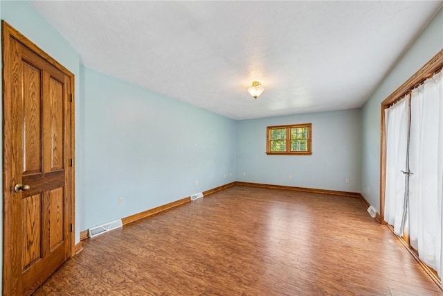 409 Park Rd, Bullskin Twp, PA 15683 - unfurnished bedroom featuring light wood-style floors