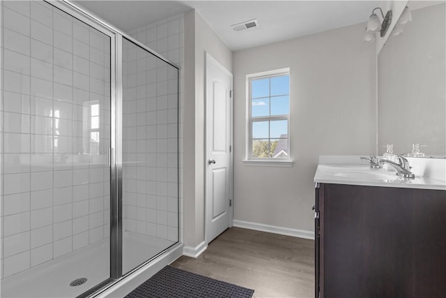 829 Frickwood Dr, South Park, PA 15129 - full bathroom featuring vanity, wood finished floors, and a shower stall
