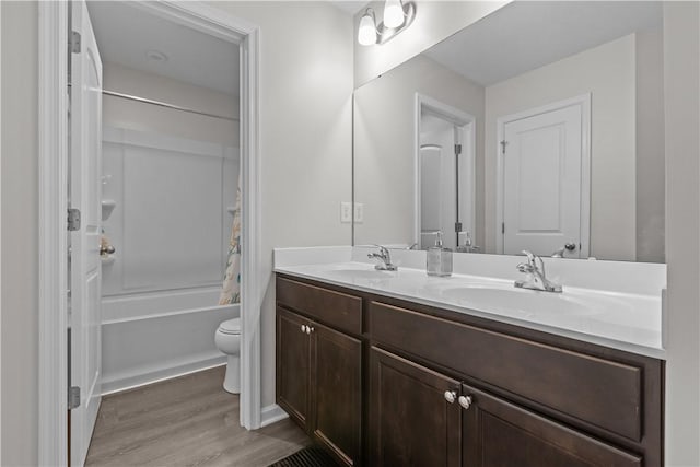 829 Frickwood Dr, South Park, PA 15129 - full bathroom with double vanity, wood finished floors, and shower / bath combination with curtain