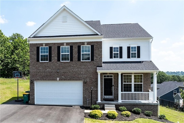 829 Frickwood Dr, South Park, PA 15129 - view of front of house with a porch, driveway, brick siding, a garage, and a front lawn