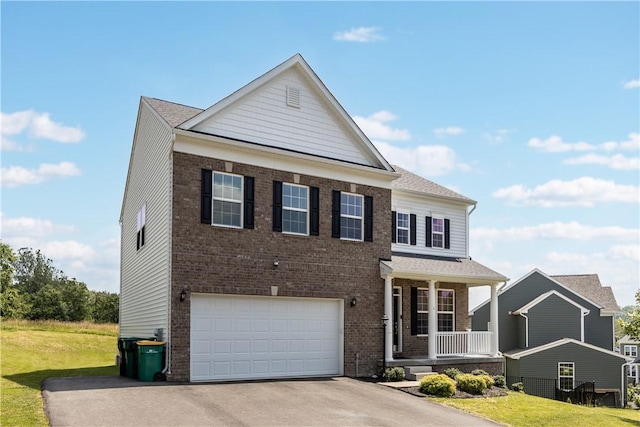 829 Frickwood Dr, South Park, PA 15129 - view of front of property with covered porch, an attached garage, driveway, and brick siding