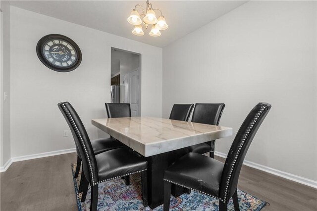 829 Frickwood Dr, South Park, PA 15129 - dining area with wood finished floors and a chandelier