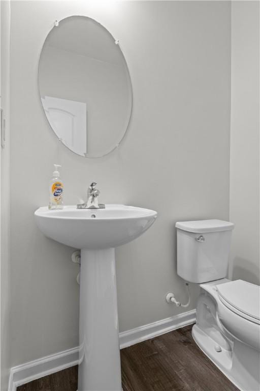 829 Frickwood Dr, South Park, PA 15129 - bathroom featuring wood finished floors and baseboards
