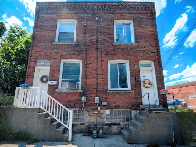 7304 Forest Way, Homewood-Brushton, PA 15208 - view of front facade featuring brick siding and cooling unit
