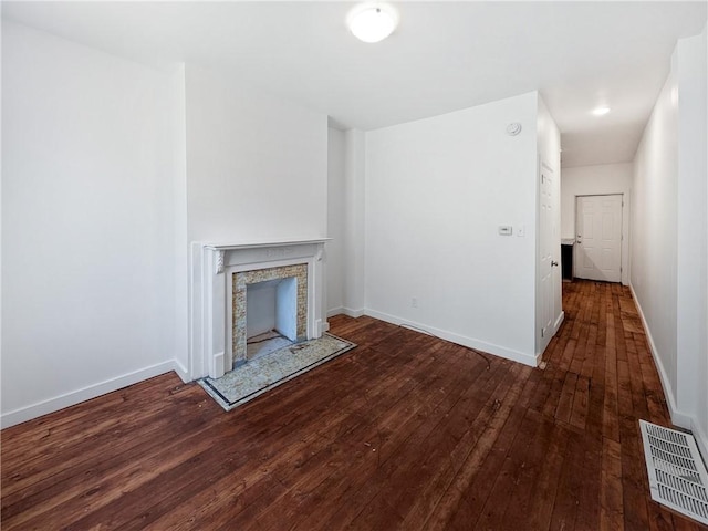 7304 Forest Way, Homewood-Brushton, PA 15208 - unfurnished living room with hardwood / wood-style floors and a fireplace