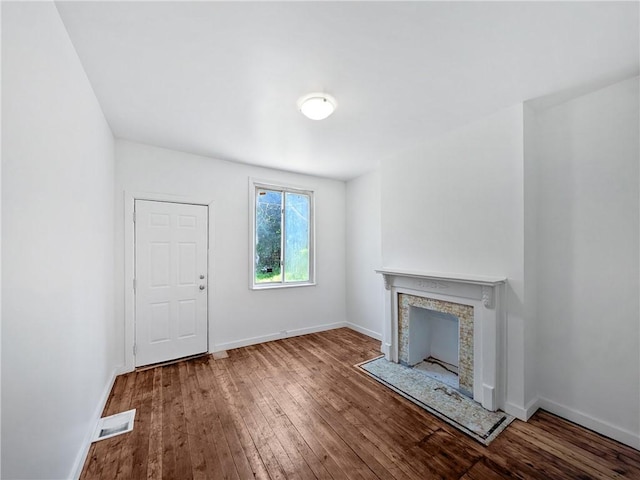 7304 Forest Way, Homewood-Brushton, PA 15208 - unfurnished living room featuring hardwood / wood-style flooring and a fireplace