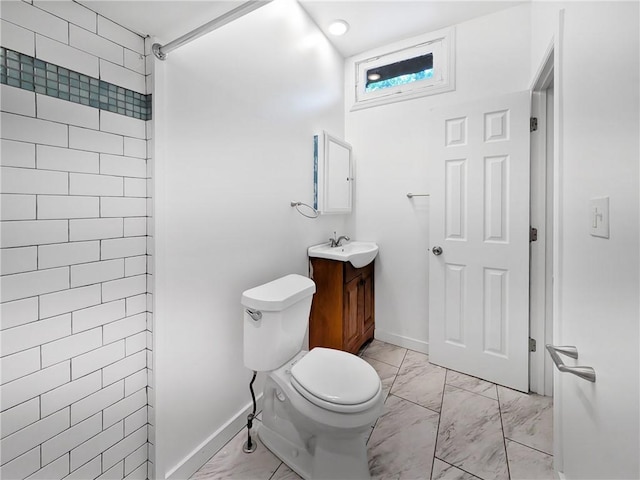 7304 Forest Way, Homewood-Brushton, PA 15208 - bathroom with marble look tile flooring, vanity, and a tile shower