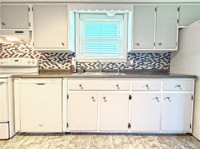 208 Beale Ave, Leechburg Boro, PA 15656 - kitchen with ventilation hood, white appliances, decorative backsplash, and dark countertops