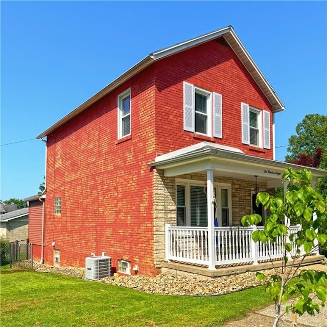 208 Beale Ave, Leechburg Boro, PA 15656 - view of side of property with a porch and brick siding