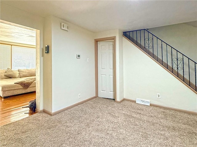 208 Beale Ave, Leechburg Boro, PA 15656 - unfurnished living room with carpet flooring and stairs