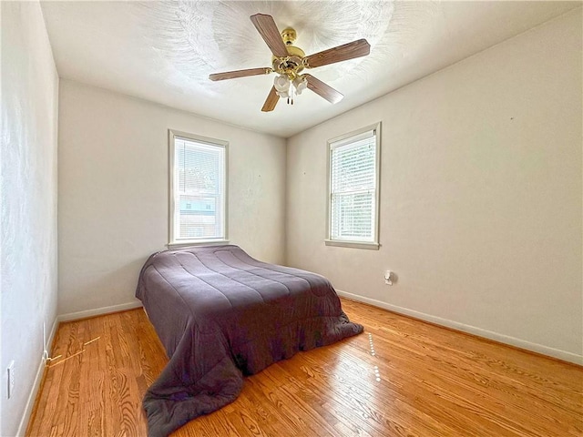 208 Beale Ave, Leechburg Boro, PA 15656 - bedroom with light wood-style flooring and ceiling fan