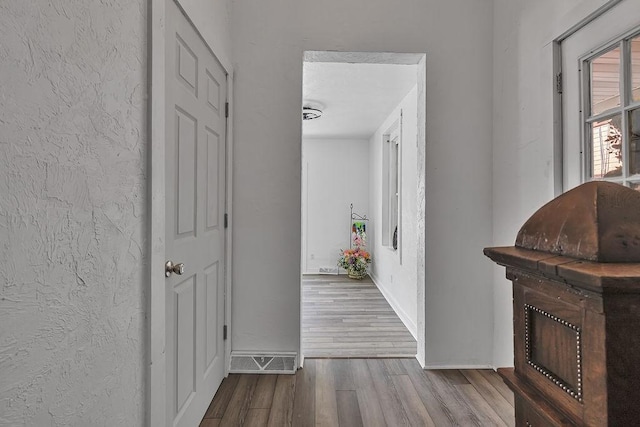 1104 Allegheny St, New Brighton, PA 15066 - hall with wood finished floors and a textured wall