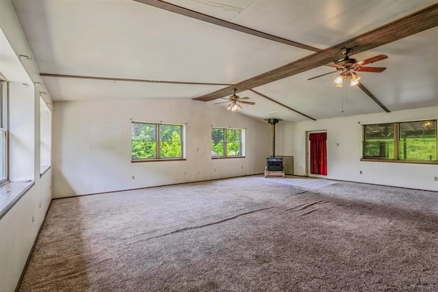 5028 W Smithfield St, Elizabeth Twp/Boro, PA 15135 - unfurnished living room with a wood stove, ceiling fan, and carpet floors
