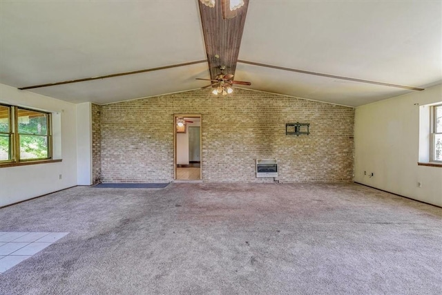 5028 W Smithfield St, Elizabeth Twp/Boro, PA 15135 - unfurnished living room with brick wall, heating unit, ceiling fan, and carpet