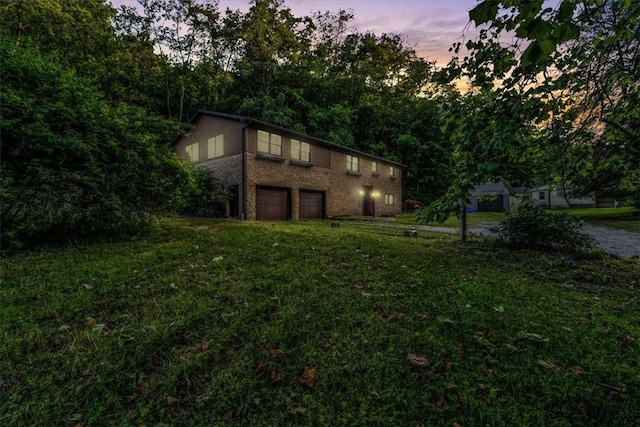 5028 W Smithfield St, Elizabeth Twp/Boro, PA 15135 - view of grassy yard featuring a garage