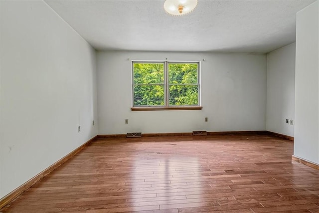 5028 W Smithfield St, Elizabeth Twp/Boro, PA 15135 - unfurnished room featuring hardwood / wood-style flooring and baseboards