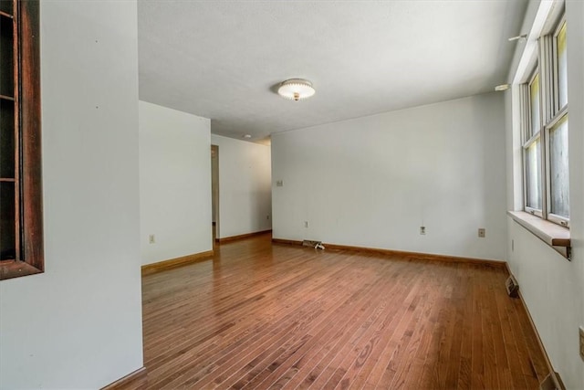 5028 W Smithfield St, Elizabeth Twp/Boro, PA 15135 - spare room featuring baseboards and wood finished floors