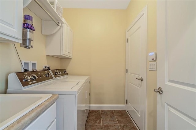 1303 Shinnecock Ct, Adams Twp, PA 16046 - laundry area with separate washer and dryer, cabinet space, and dark tile patterned floors