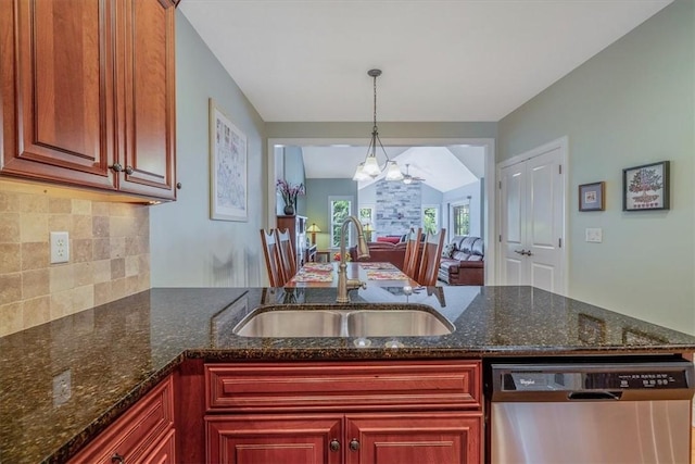 1303 Shinnecock Ct, Adams Twp, PA 16046 - kitchen featuring stainless steel dishwasher, decorative backsplash, pendant lighting, dark stone counters, and a peninsula
