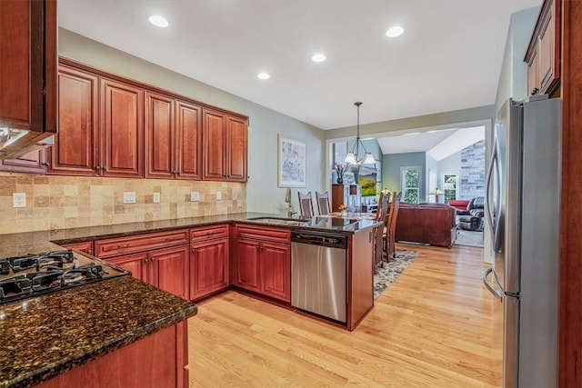 1303 Shinnecock Ct, Adams Twp, PA 16046 - kitchen featuring stainless steel appliances, light wood-style flooring, open floor plan, a peninsula, and recessed lighting
