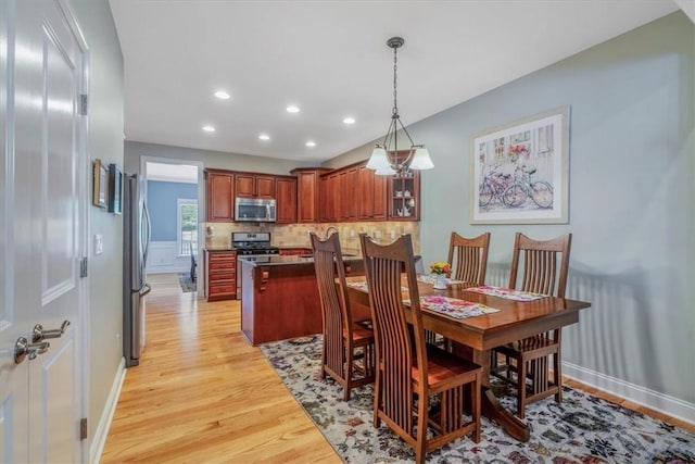 1303 Shinnecock Ct, Adams Twp, PA 16046 - dining room featuring light wood finished floors and recessed lighting
