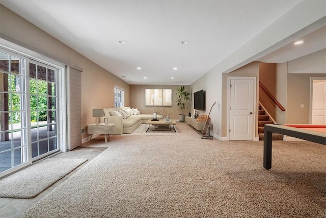 1303 Shinnecock Ct, Adams Twp, PA 16046 - carpeted living area with healthy amount of natural light, recessed lighting, and stairway