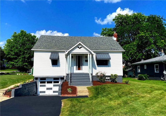 118 Delaware Ave, Scottdale, PA 15683 - bungalow with a shingled roof, a garage, a front lawn, and driveway
