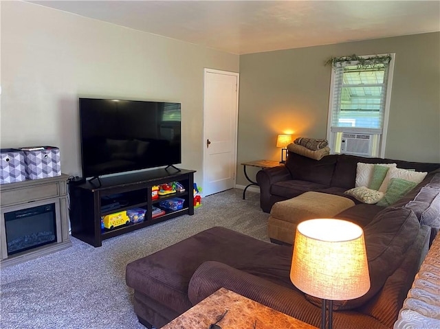 118 Delaware Ave, Scottdale, PA 15683 - living area featuring carpet flooring, a glass covered fireplace, and cooling unit
