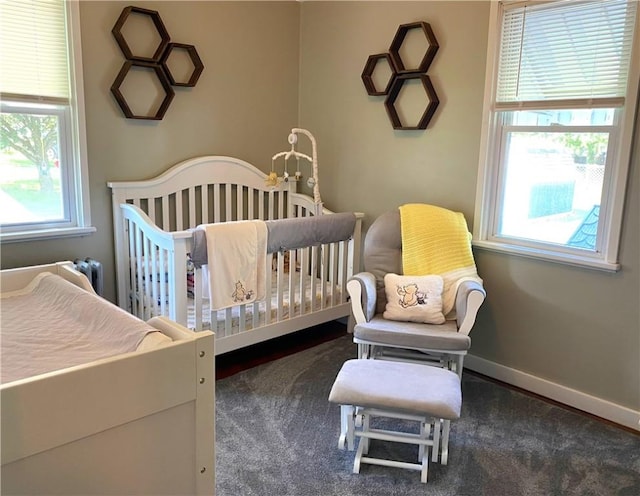 118 Delaware Ave, Scottdale, PA 15683 - bedroom featuring multiple windows, a crib, and radiator