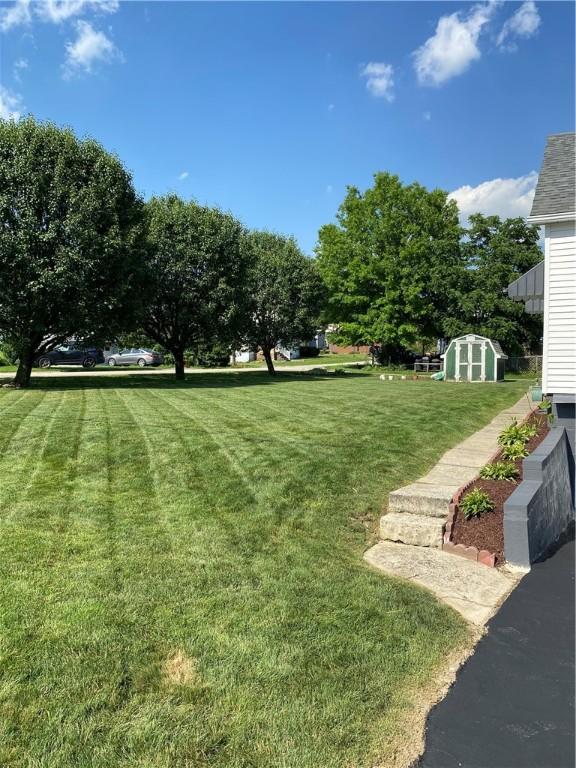 118 Delaware Ave, Scottdale, PA 15683 - view of grassy yard with a storage shed