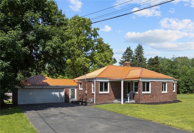 389 Mercer Rd, Hempfield Twp Mer, PA 16125 - single story home with brick siding, a front yard, a chimney, and a metal roof