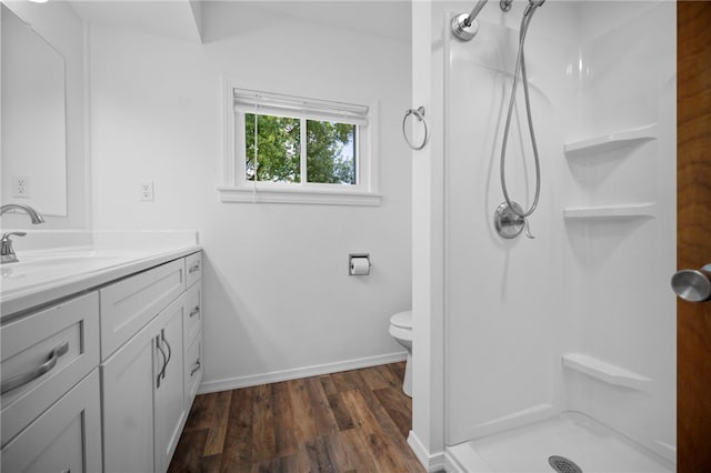 389 Mercer Rd, Hempfield Twp Mer, PA 16125 - bathroom featuring vanity, a stall shower, and wood finished floors