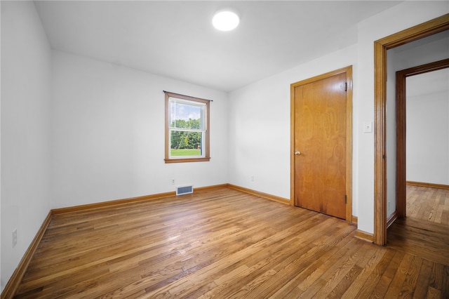 389 Mercer Rd, Hempfield Twp Mer, PA 16125 - unfurnished bedroom with wood-type flooring and baseboards