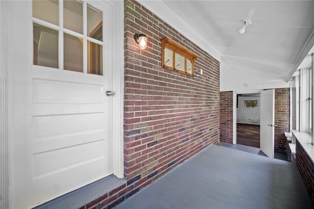 389 Mercer Rd, Hempfield Twp Mer, PA 16125 - view of exterior entry with brick siding and covered porch