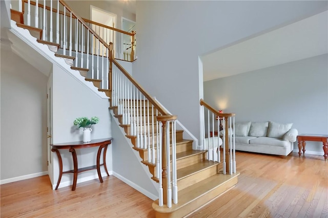 216 Beagle Dr, Moon/Crescent Twp, PA 15108 - staircase featuring wood finished floors and baseboards