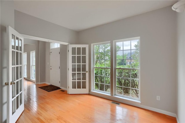 216 Beagle Dr, Moon/Crescent Twp, PA 15108 - entryway featuring plenty of natural light, light wood-style floors, and french doors