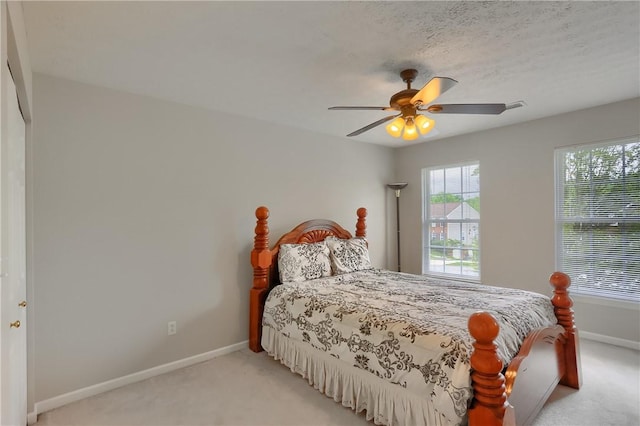 216 Beagle Dr, Moon/Crescent Twp, PA 15108 - bedroom featuring light carpet and a ceiling fan