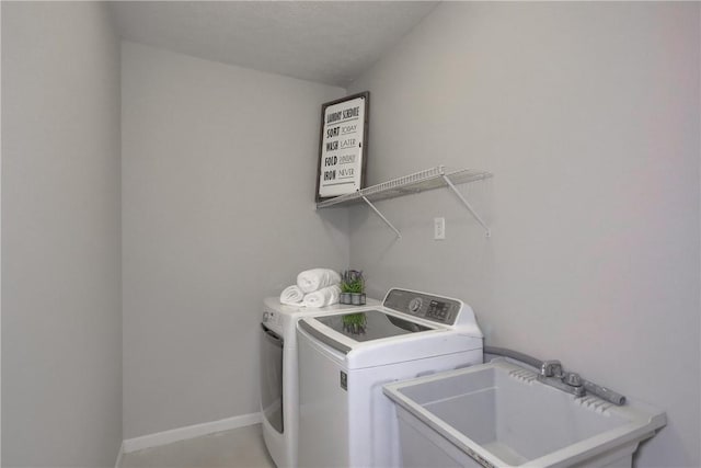 216 Beagle Dr, Moon/Crescent Twp, PA 15108 - washroom featuring washer and clothes dryer and baseboards