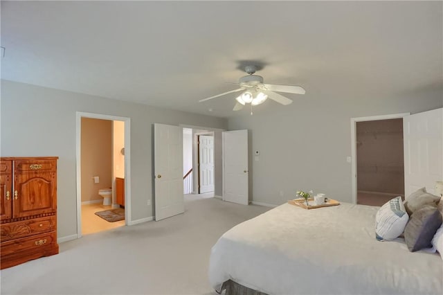 216 Beagle Dr, Moon/Crescent Twp, PA 15108 - bedroom featuring a spacious closet, connected bathroom, a closet, light colored carpet, and ceiling fan