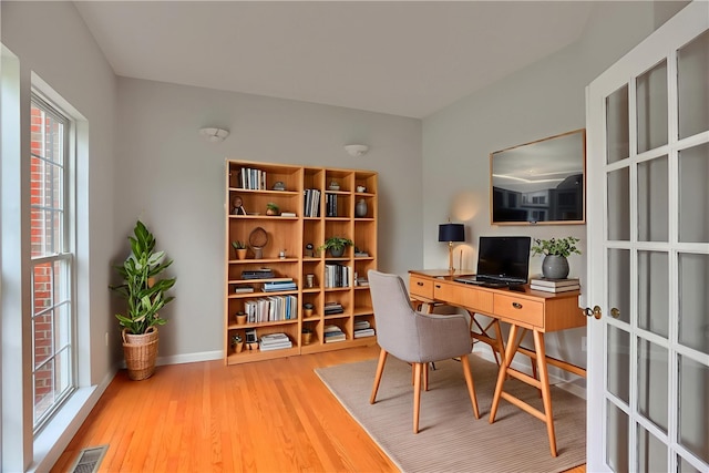 216 Beagle Dr, Moon/Crescent Twp, PA 15108 - office area featuring wood finished floors and plenty of natural light