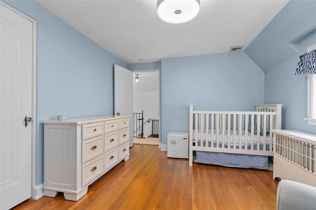 234 Orchard Dr, Mt Lebanon, PA 15228 - bedroom featuring light wood-style floors and lofted ceiling