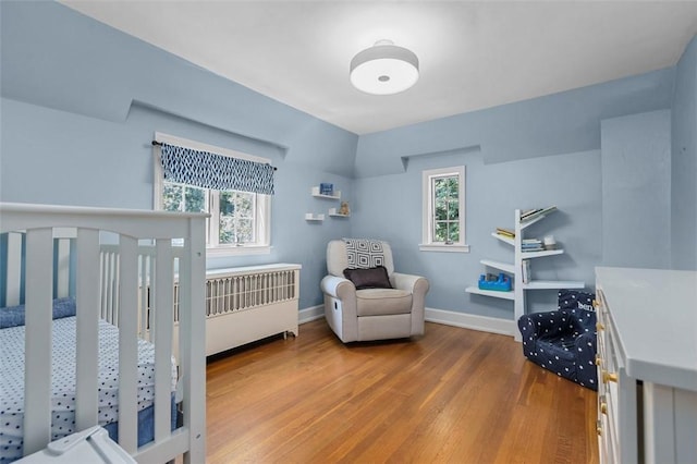 234 Orchard Dr, Mt Lebanon, PA 15228 - bedroom featuring wood finished floors and a crib